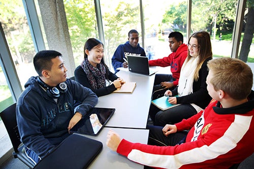 Students talking at table