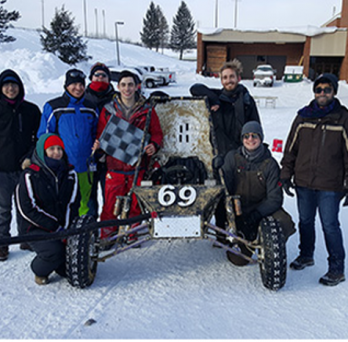 Students with Baja car 