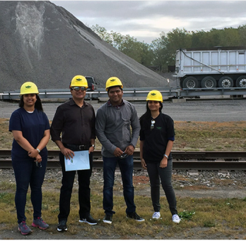 Professor Reddy with students at landfill 
