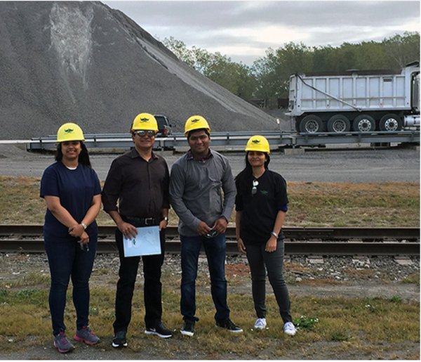 Professor Reddy with students at landfill
