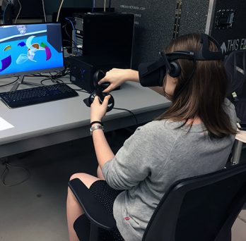 Student Using Virtual Reality System 