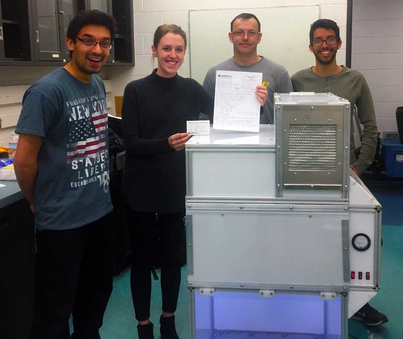 Students with finished sanitary cabinet