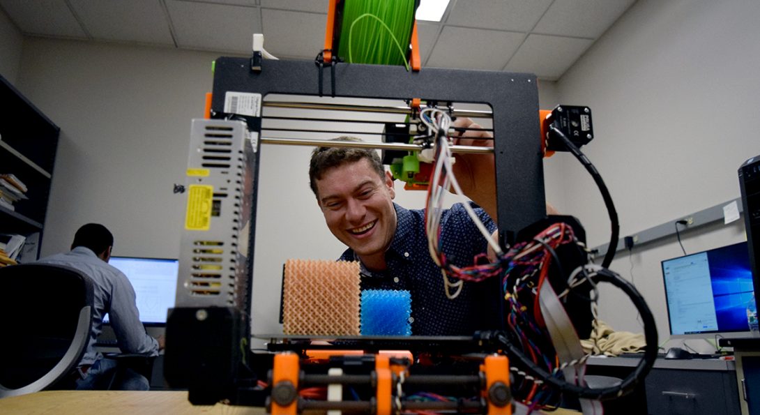 John Klein using a 3D printer