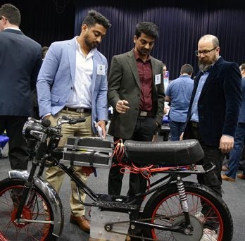 Viewers Admire Bike Design 