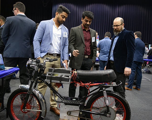 Viewers Admire Bike Design