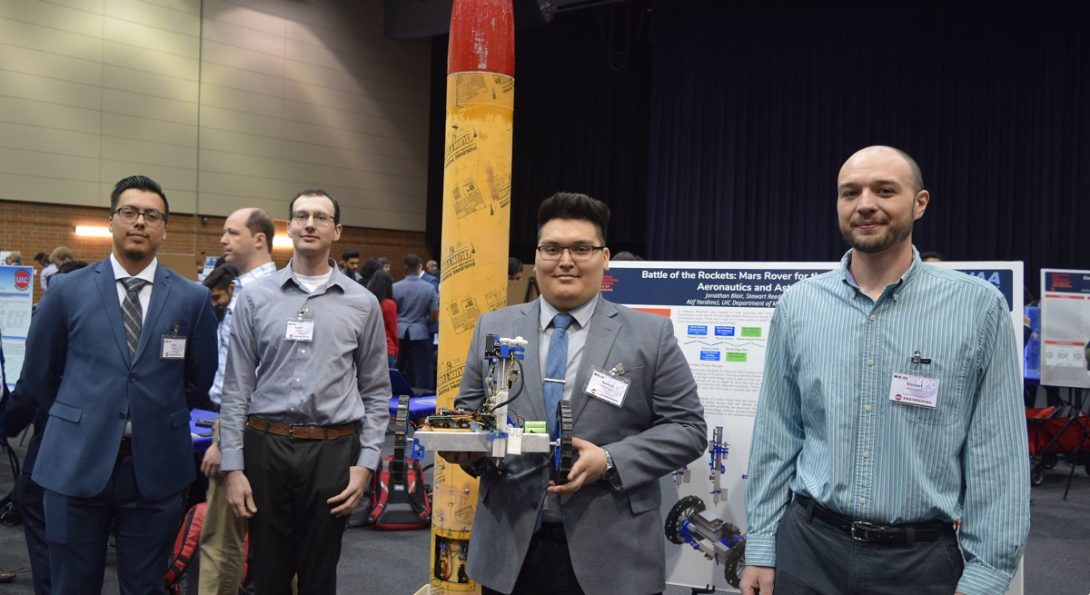 Students display rocket and rover