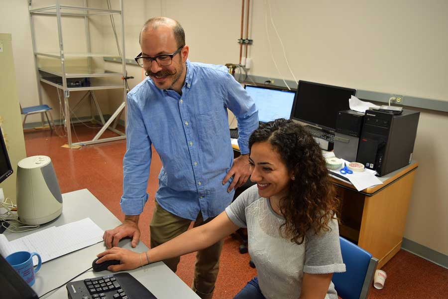 Professor Berniker and student at lab