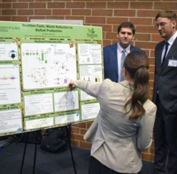 Students presenting poster
                  