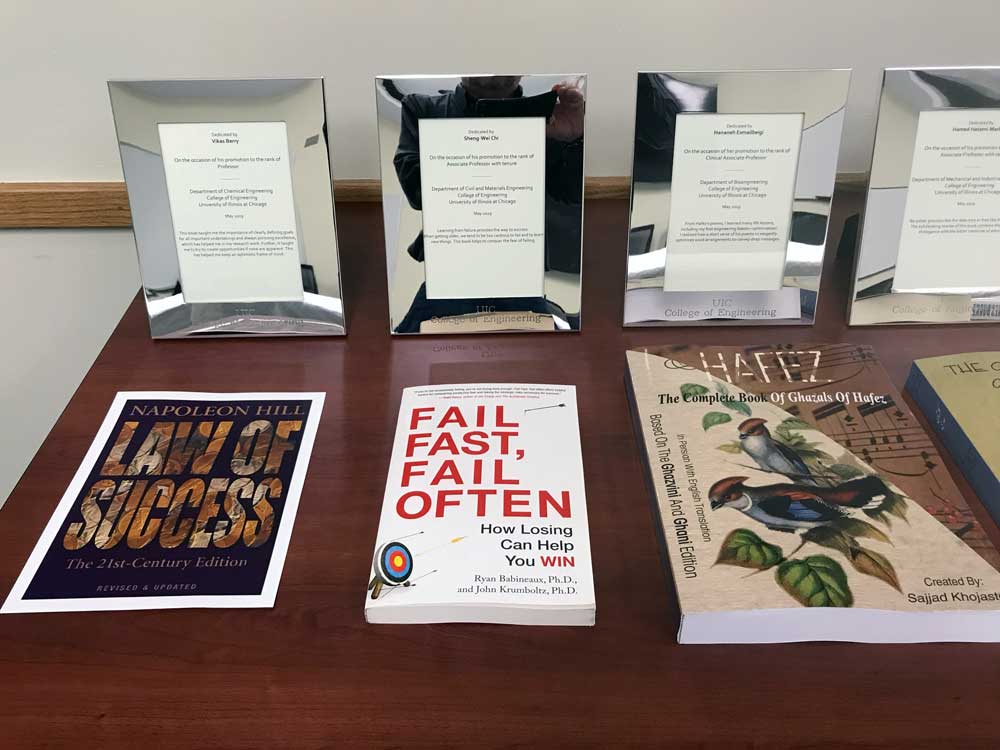 faculty books laid out on a table