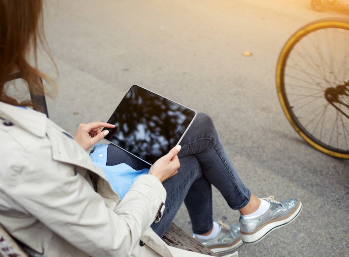 person looks at computer