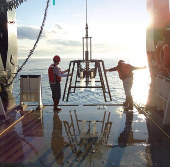 Karl Rockne, a professor in civil, materials, and environmental engineering and the associate dean of research in the COE at UIC, surveying the Great Lakes. 