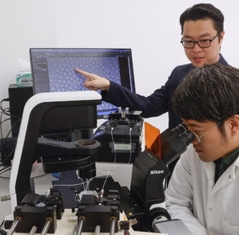 University of Illinois Chicago College of Engineering BME professor Jae-Won Shin speaks to post doctoral student Ik Sung Cho about the Janus Microgel preparation. 