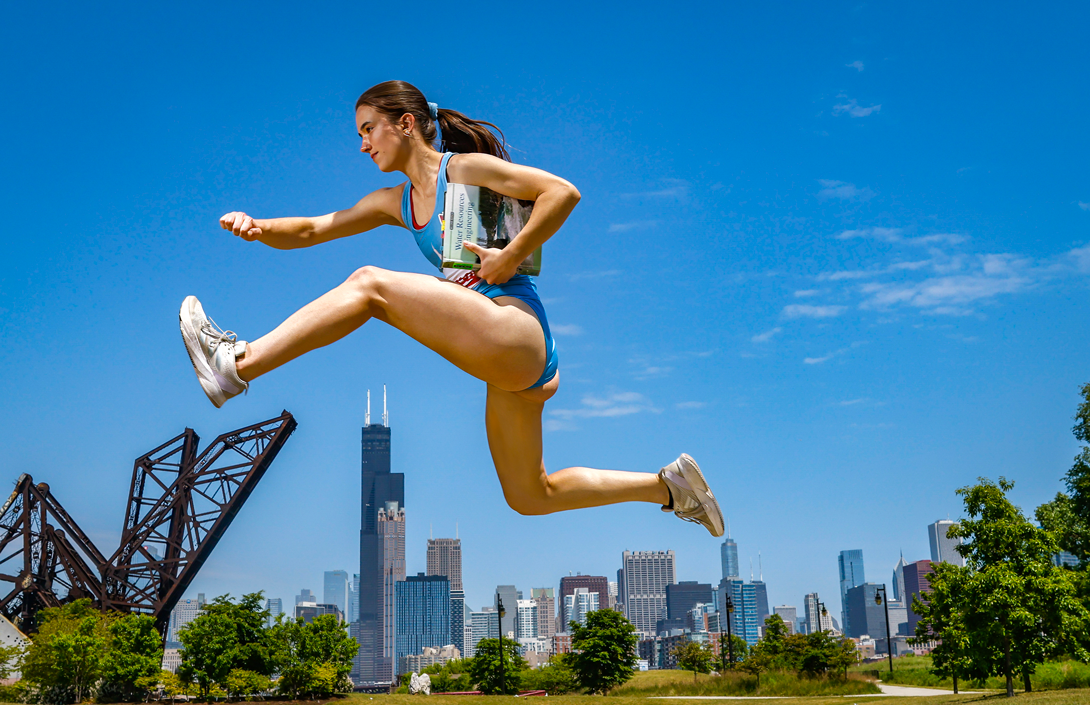 Haley Dahl track photo with her hurdling the Willis Tower.