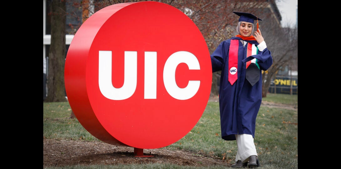 student by UIC circle sculpture