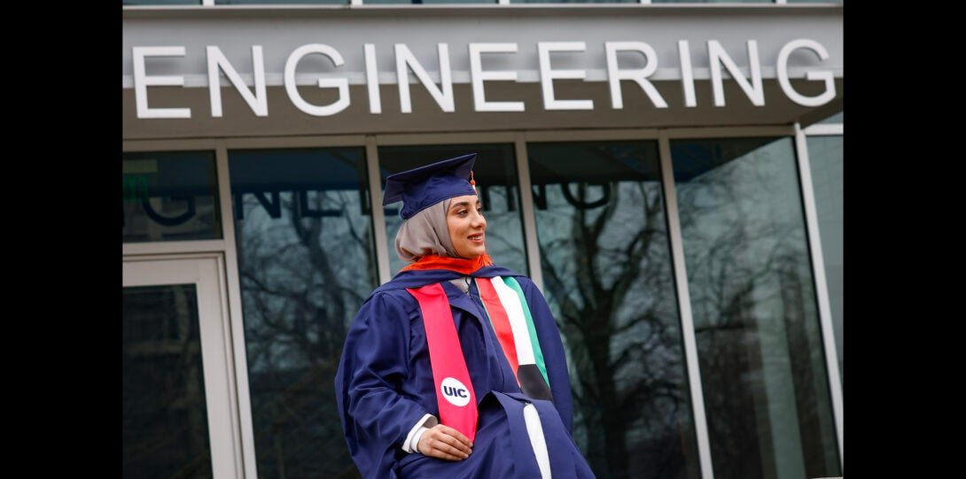 student underneath engineering building name