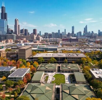 Drone shot of East Campus with the skyline in the background
                  