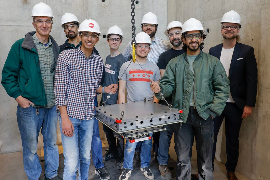 A team of MIE students recently built and conducted a drop test for a celestial landing device in UIC’s High Bay Lab, a part of their capstone project sponsored by NASA.