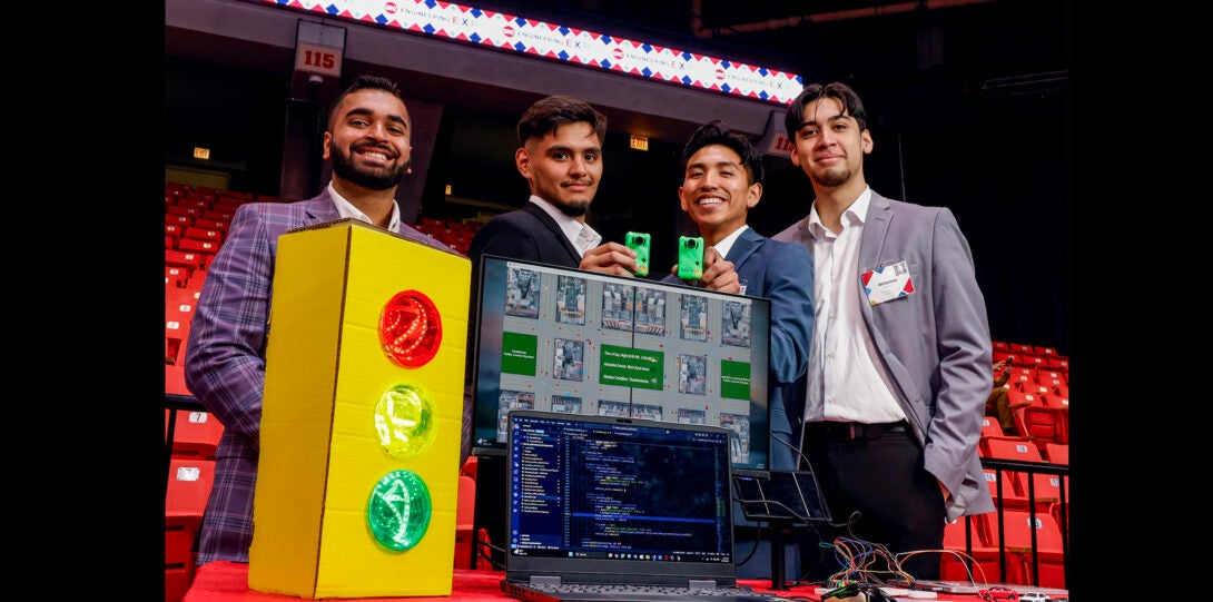 students pose with project based on traffic patterns
